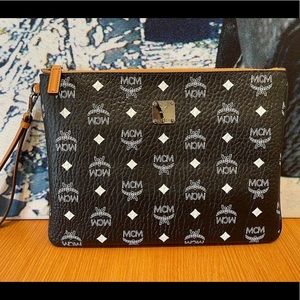 MCM unsex medium size pouch $325+ tax